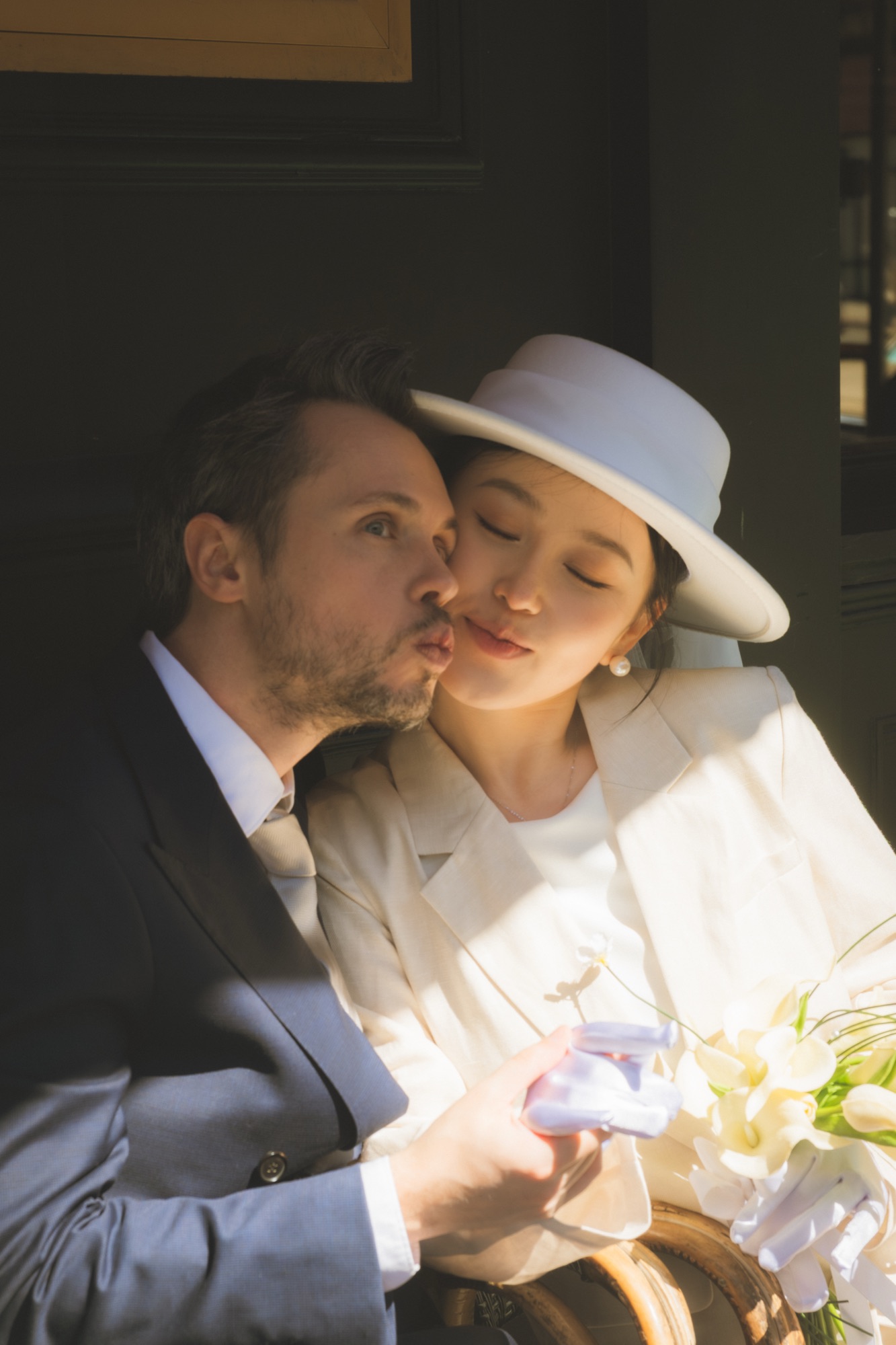 A quiet sunlit portrait of the newlyweds