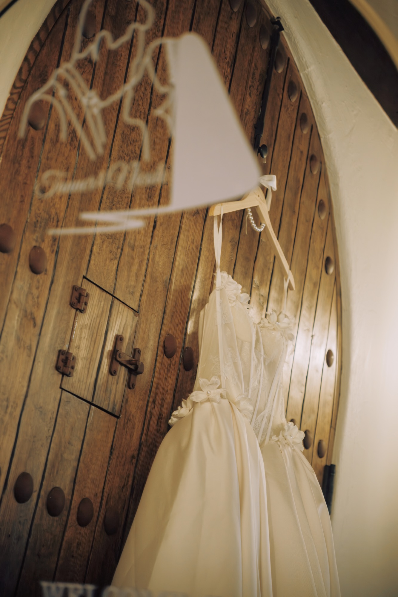 Nicole’s wedding dress hanging before the ceremony